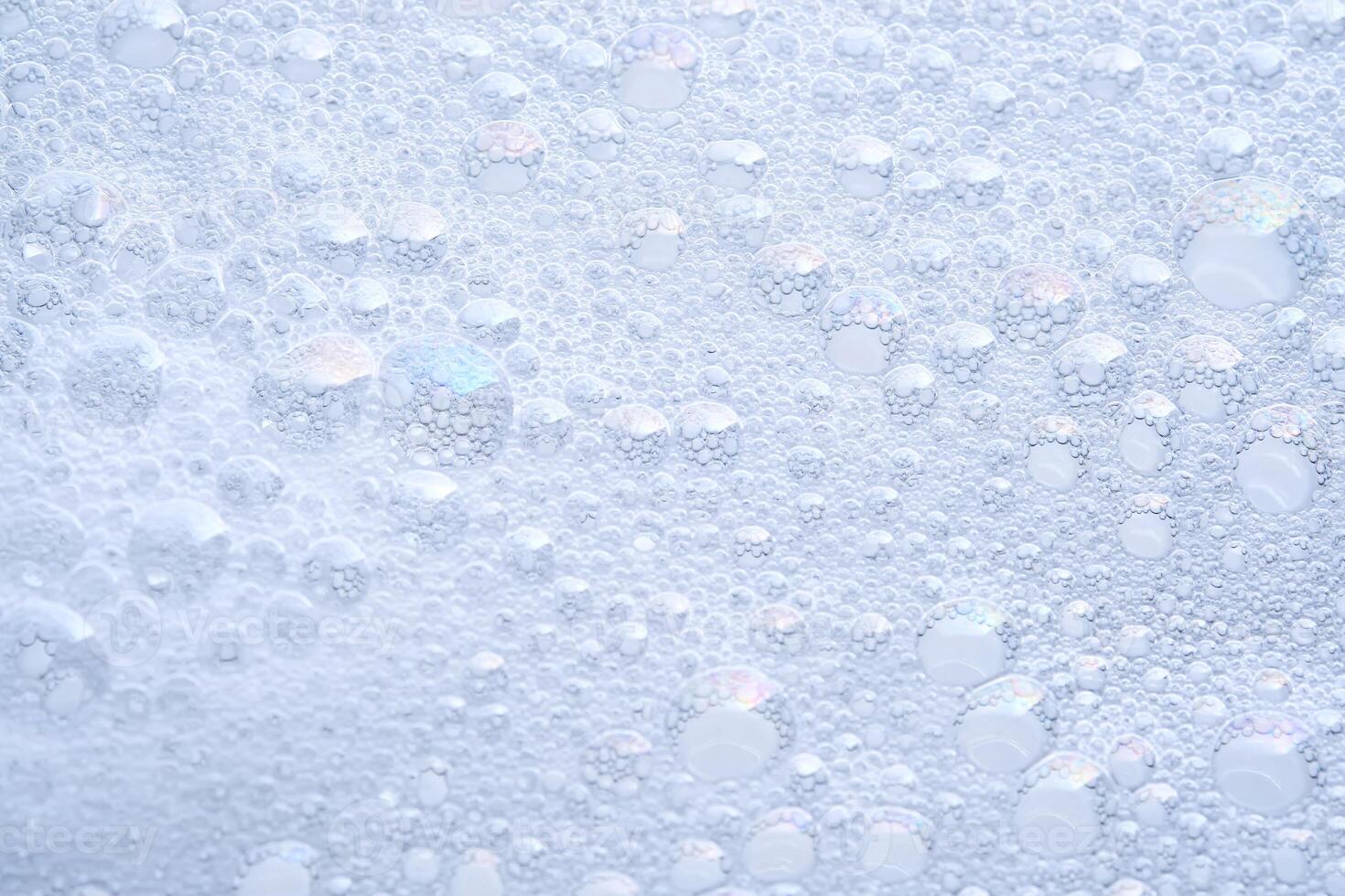 The texture of dense foam with bubbles. photo