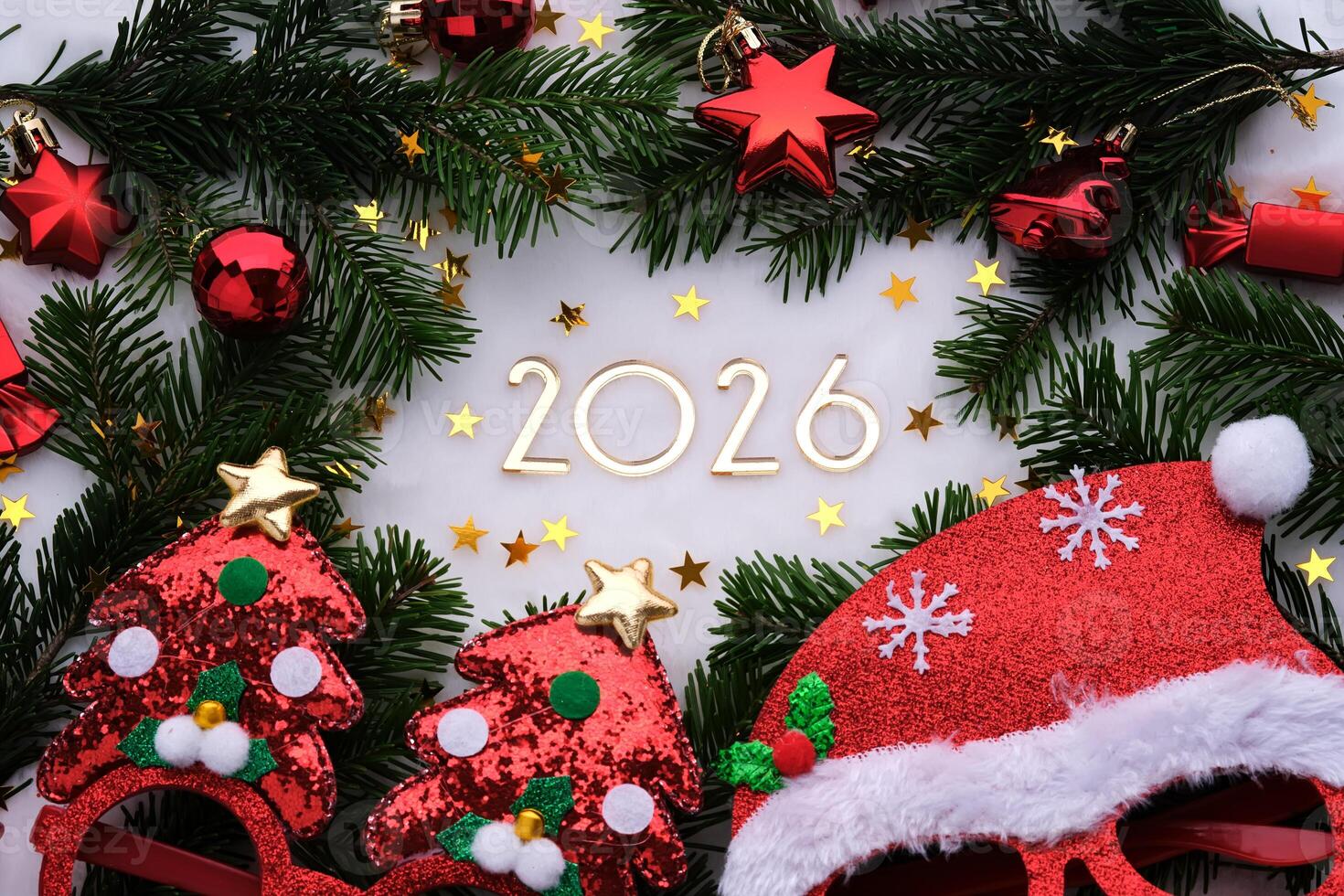 Abstract background of Christmas attributes with the year number 2026. photo