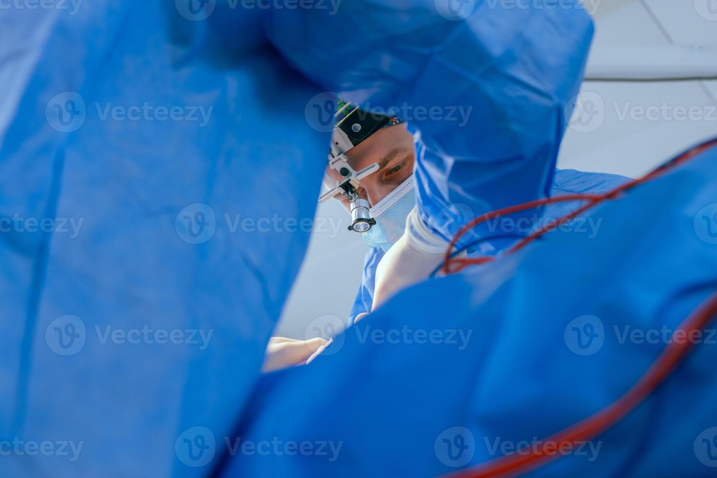 male surgeons perform surgery in operating room, plastic surgeon in operating room photo