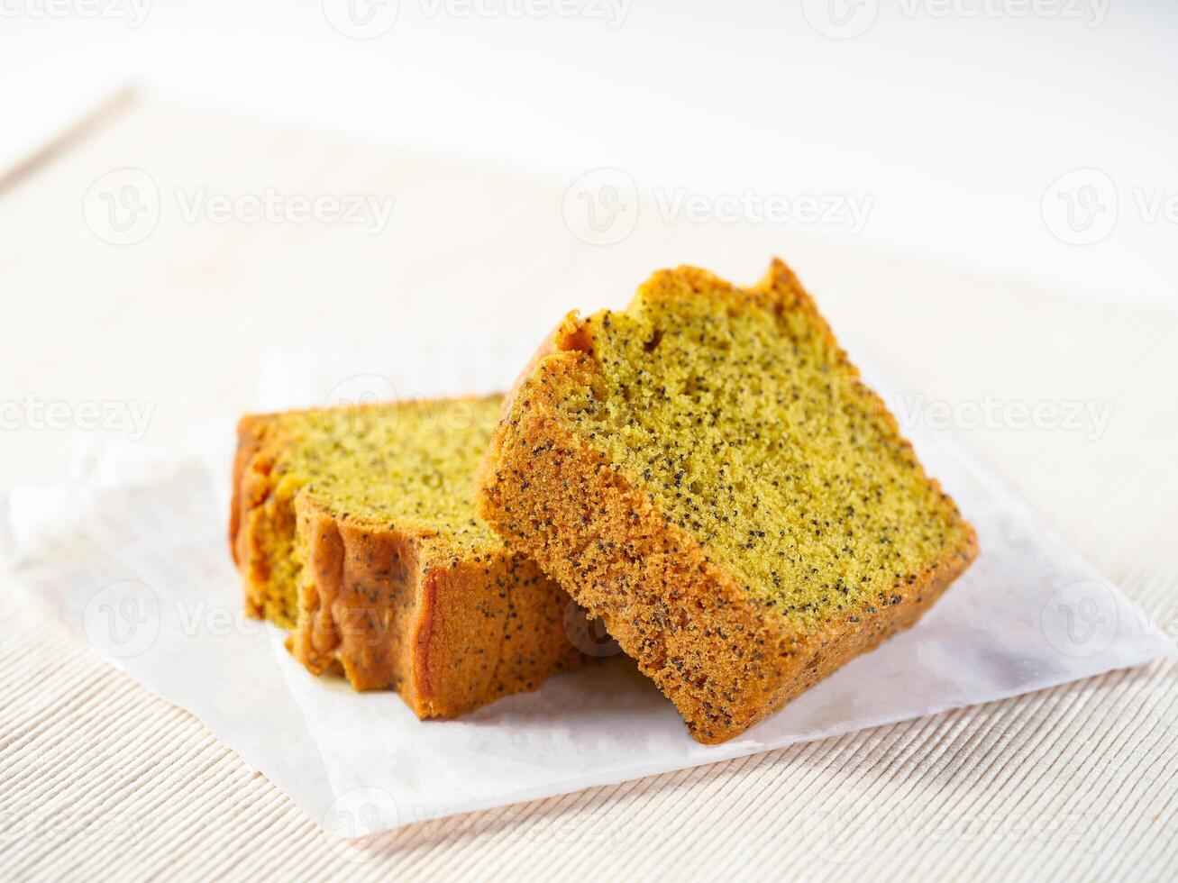 Lemon Poppy Seed Pound Cake Slices in plate side view of Moist Dessert photo