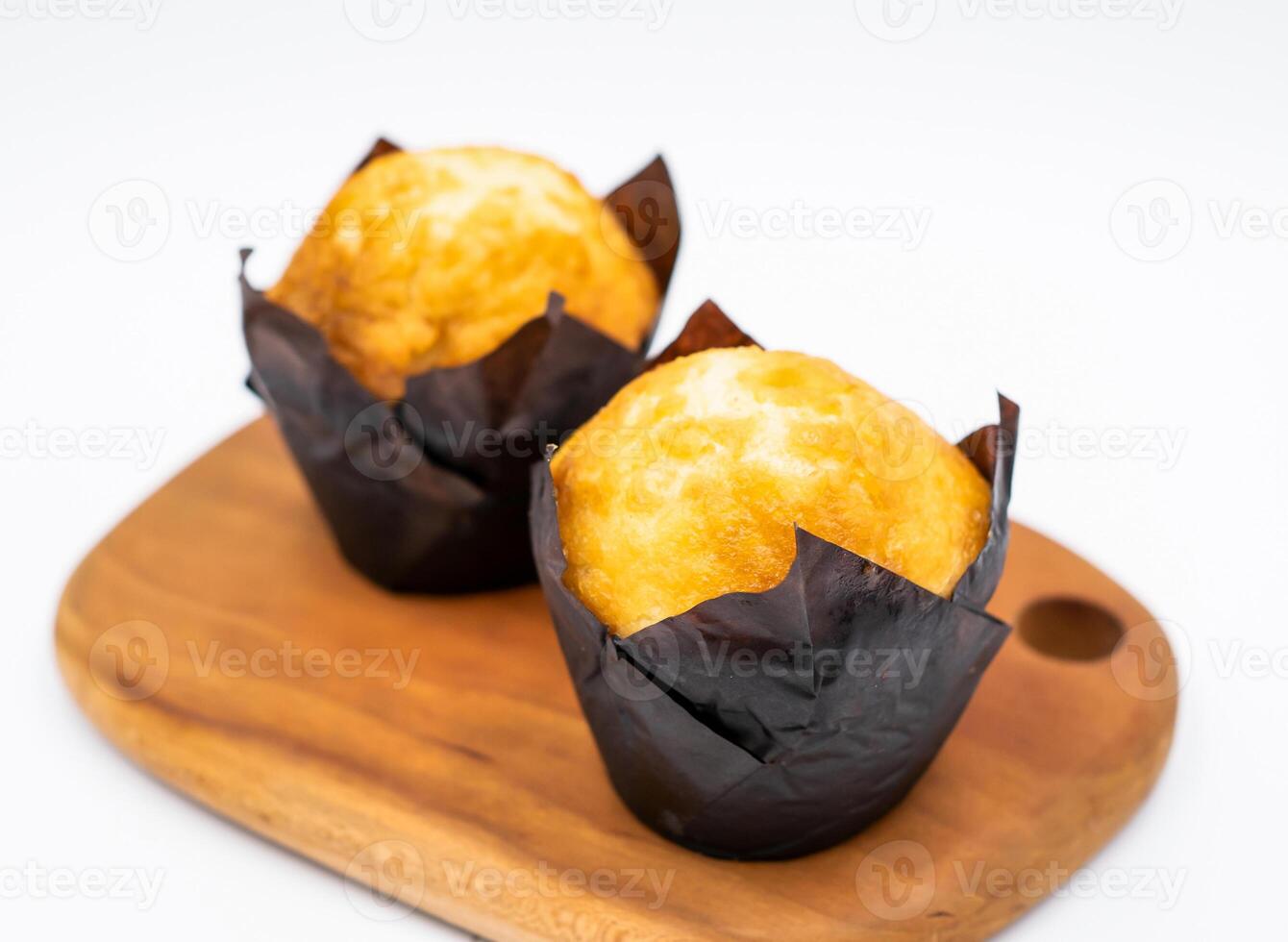 Golden Caramel Apricot Muffins on Wood Board Side View of Perfect Sweet Breakfast photo