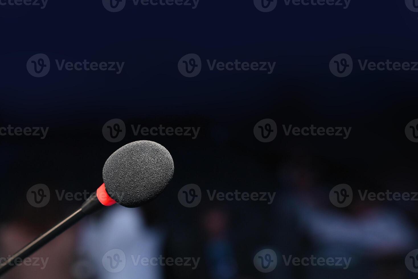 Microphone in a lecture environment with a blurred background photo