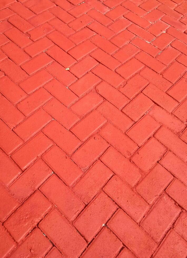 Close-up of a textured brick path with geometric patterns, showcasing the urban ground surface photo