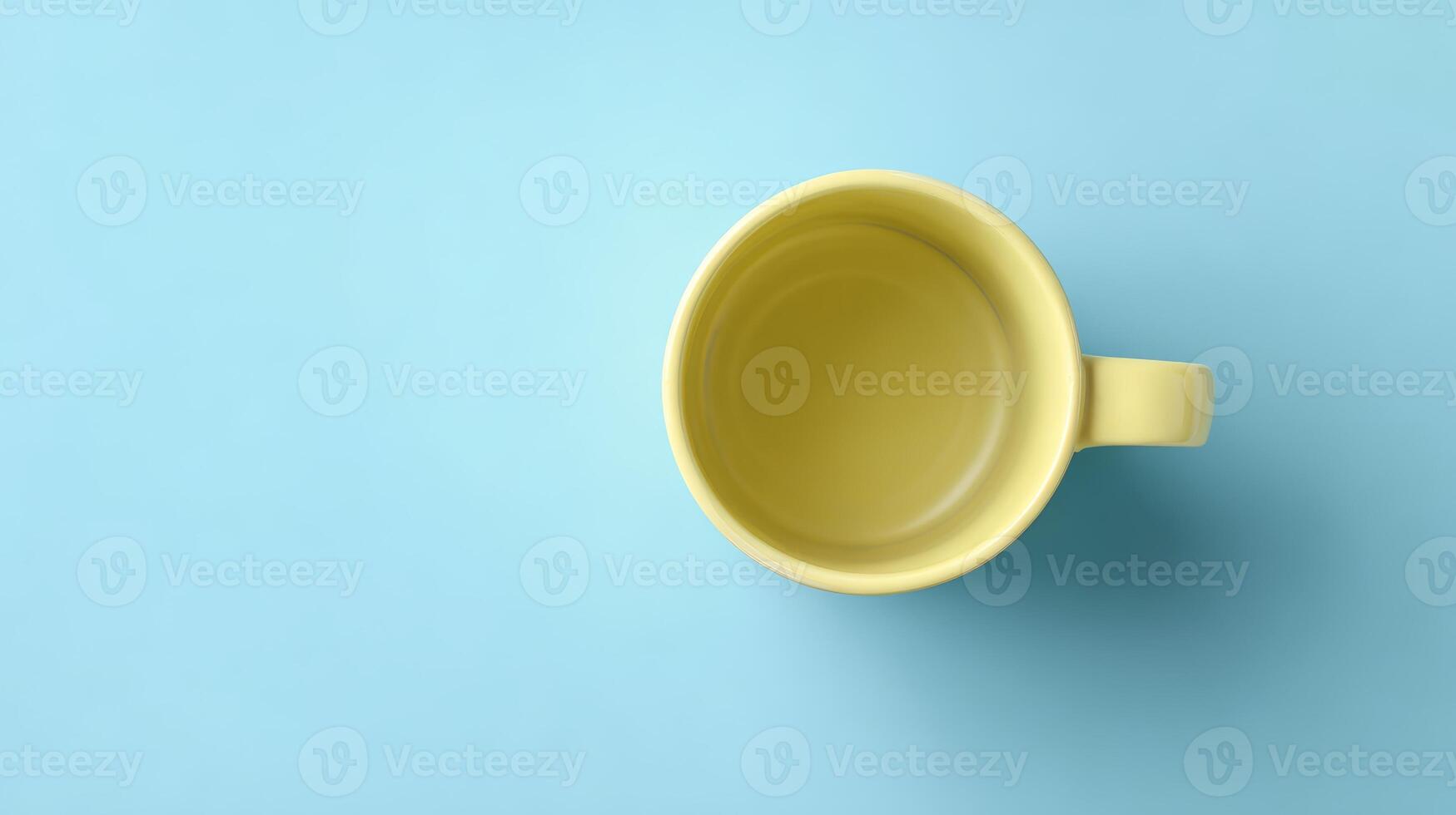 Pastel Yellow Mug on Bright Blue Background photo