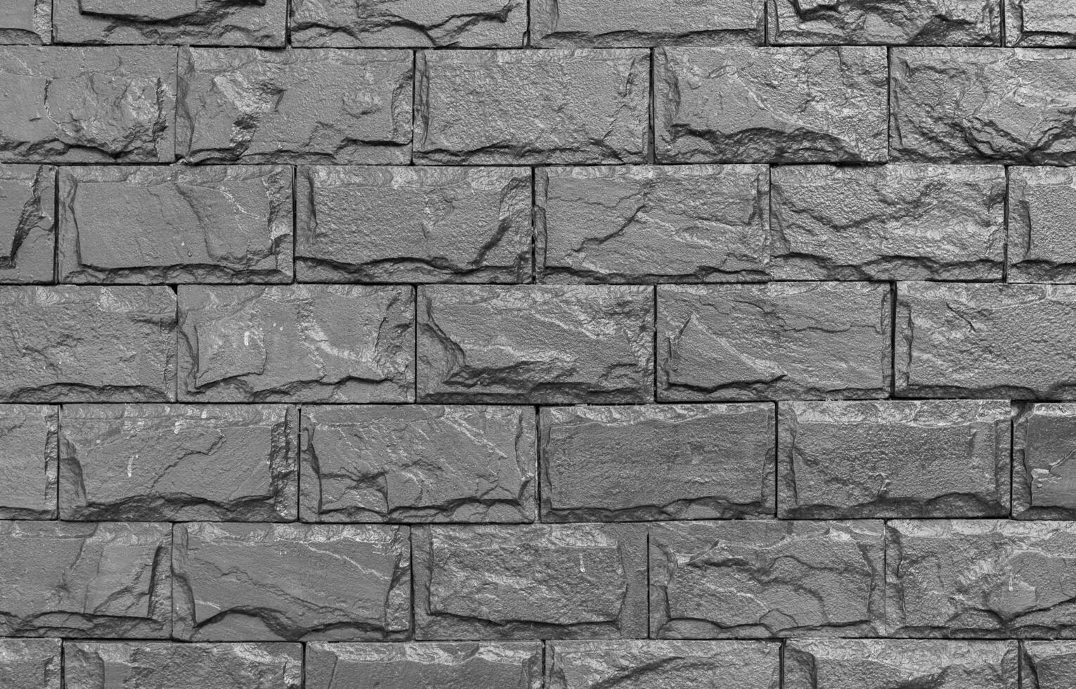 Old vintage retro style dark bricks wall for abstract brick background and texture. photo