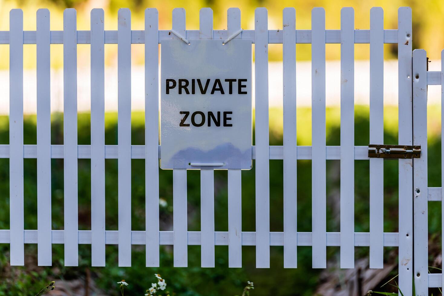 Private zone sign at outdoor fence for privacy concept. photo