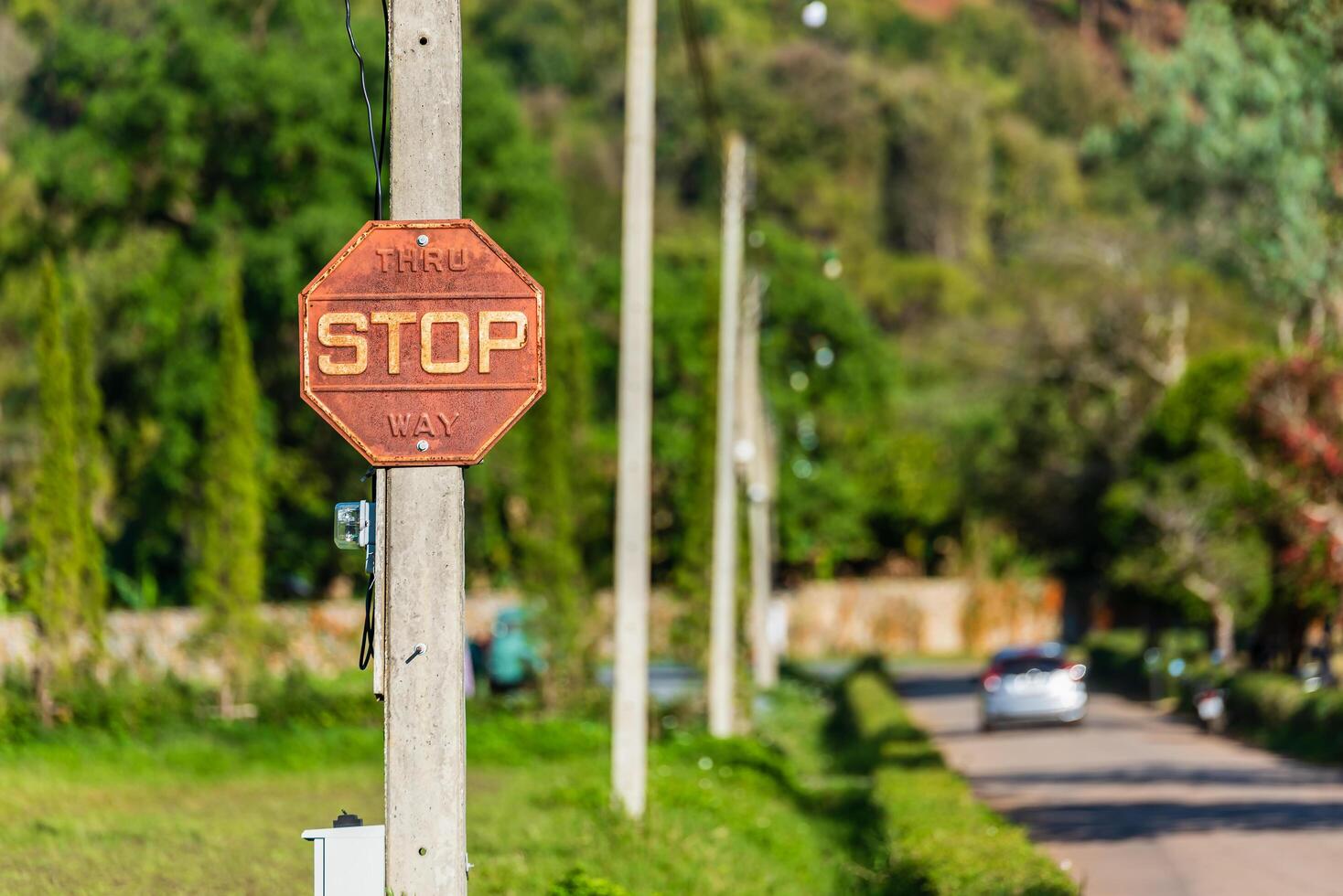 Old vintage retro style rusty metal traffic stop sign for traffic concept. photo