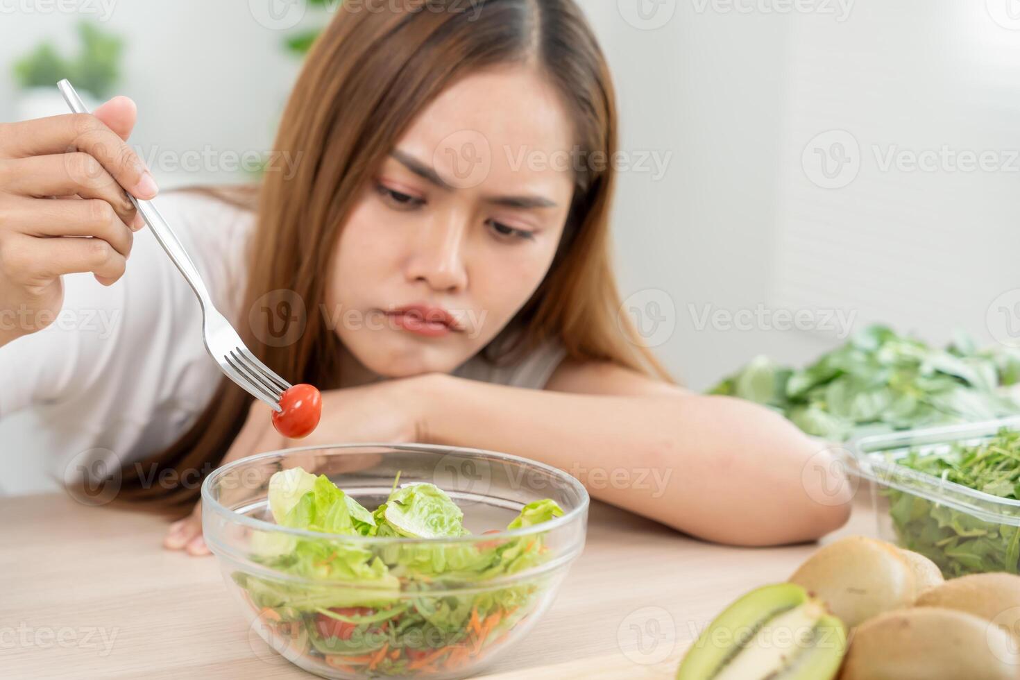 asian women bored diet food, dieting female choose low calories food for diet. Good healthy food. weight lose, balance, control, reduce fat, routines, exercise, body shape photo