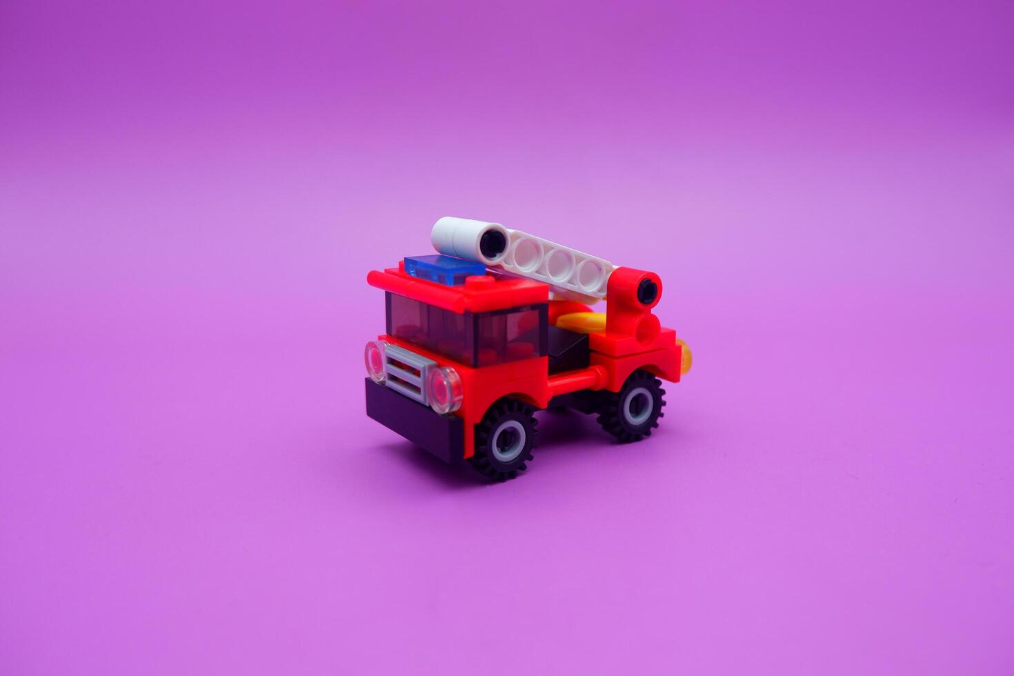 Colorful Fire Truck Toy Made from Plastic Bricks photo