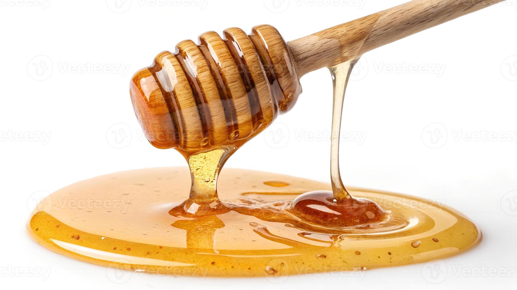 Delicious honey dripping from a wooden dipper. photo