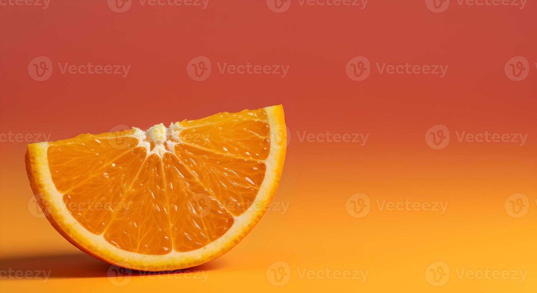 Glowing orange slice rests on vibrant coral to yellow gradient. photo