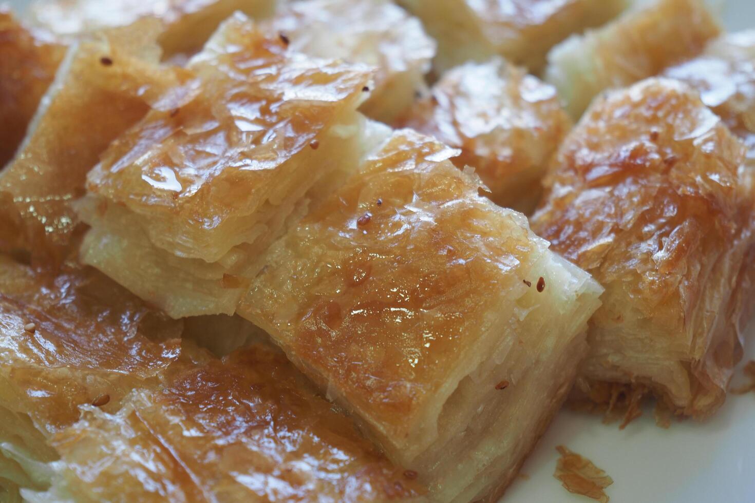Traditional turkish borek served on a plate in a bright kitchen photo
