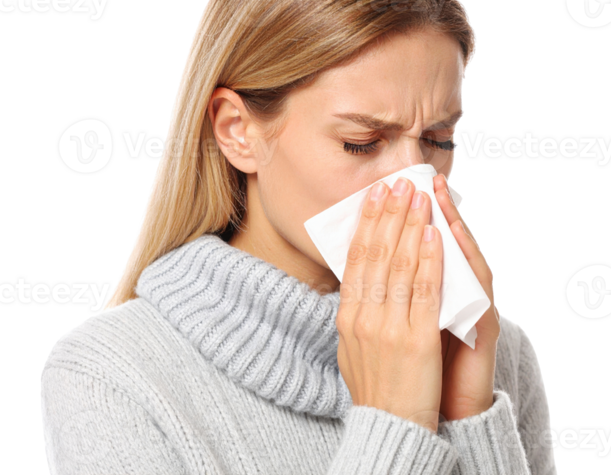 Young woman blowing nose into tissue while suffering from cold, flu or allergies png
