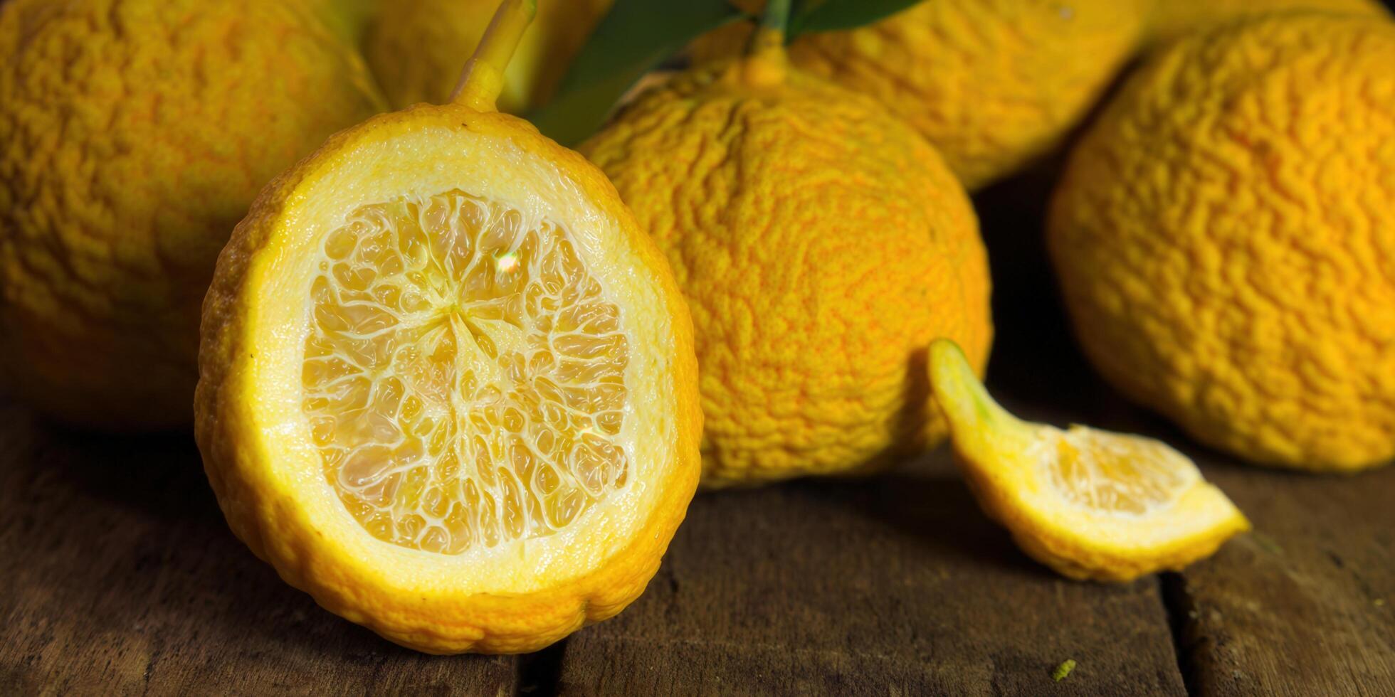 A vibrant, sliced lemon displaying its fresh and juicy interior, ready to be enjoyed. photo
