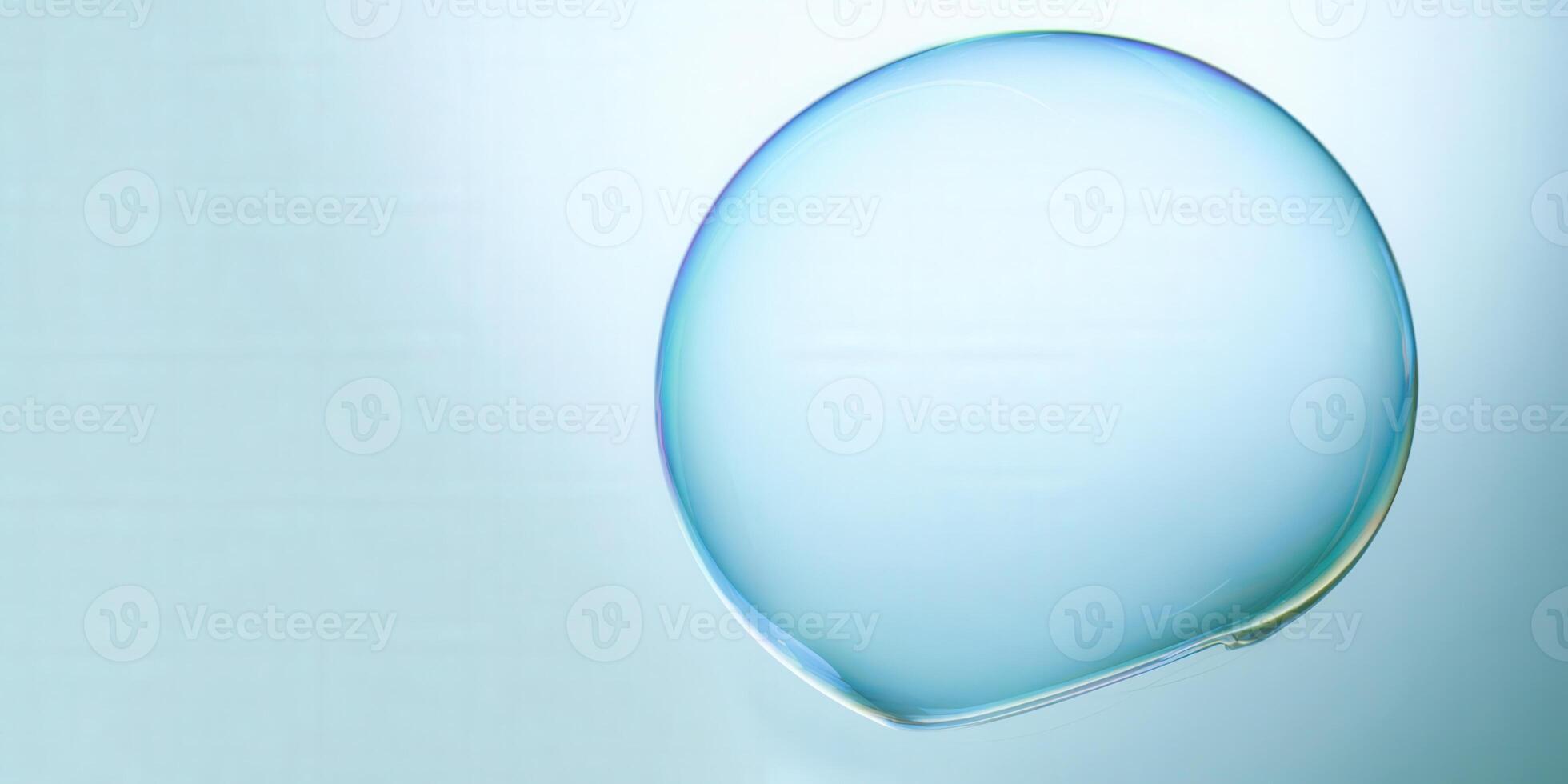 A large soap bubble floats with stunning iridescence against a soft blue backdrop. photo