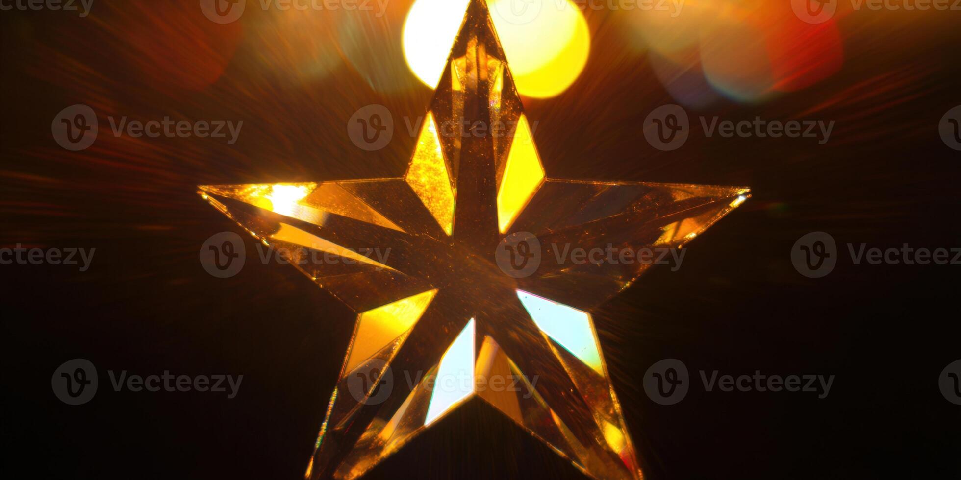 A golden crystal star shines brilliantly against a dark, bokeh-filled background. photo