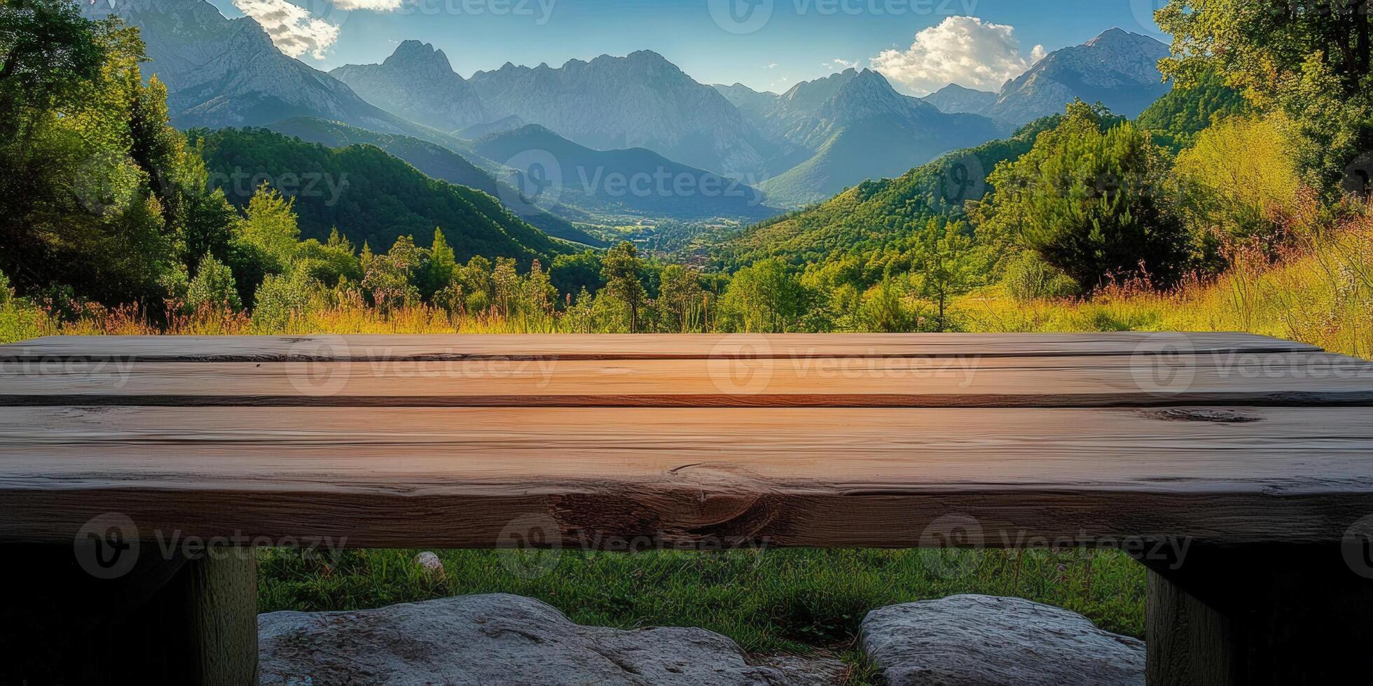A scenic mountain landscape with a wooden table in the foreground, inviting viewers to enjoy the view. photo