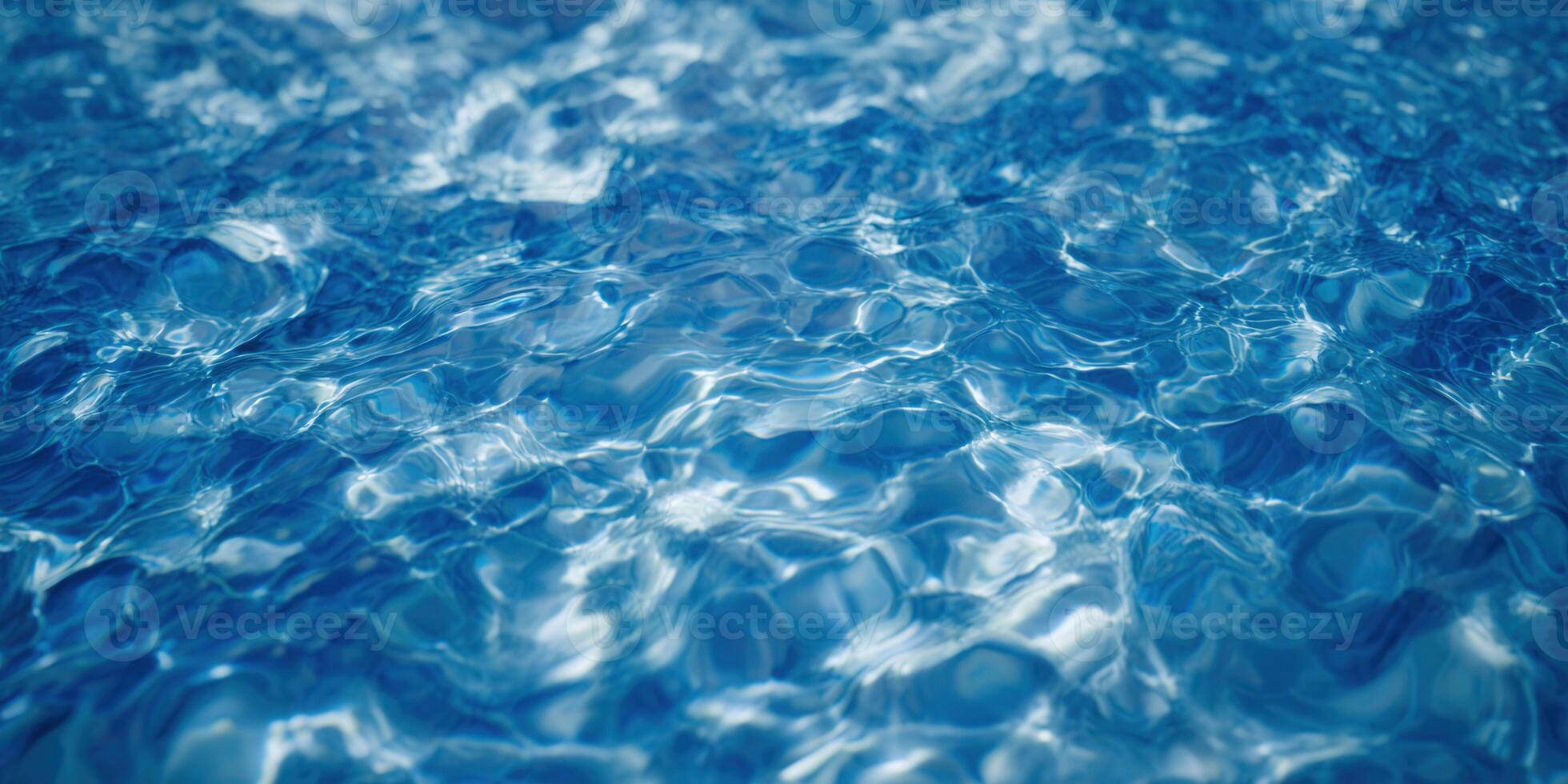 The image showcases a close-up view of clear blue water with gentle ripples, creating a sense of peace and tranquility. photo