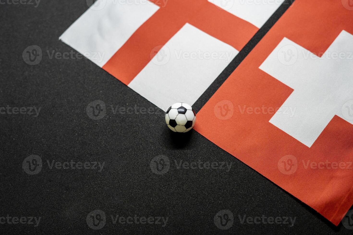 England vs Switzerland, Football match with national flags photo