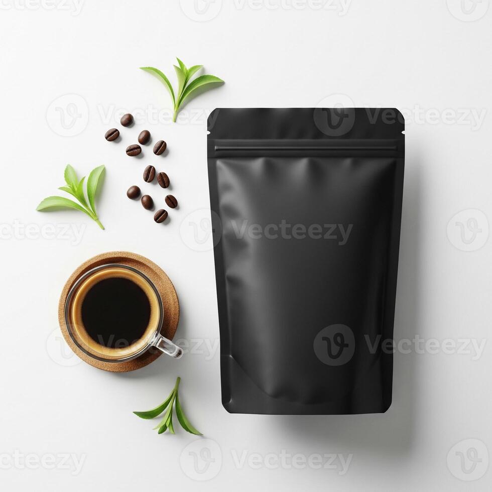 Elegant Coffee Composition Black Pouch, Coffee Cup, Beans, and Greenery. photo