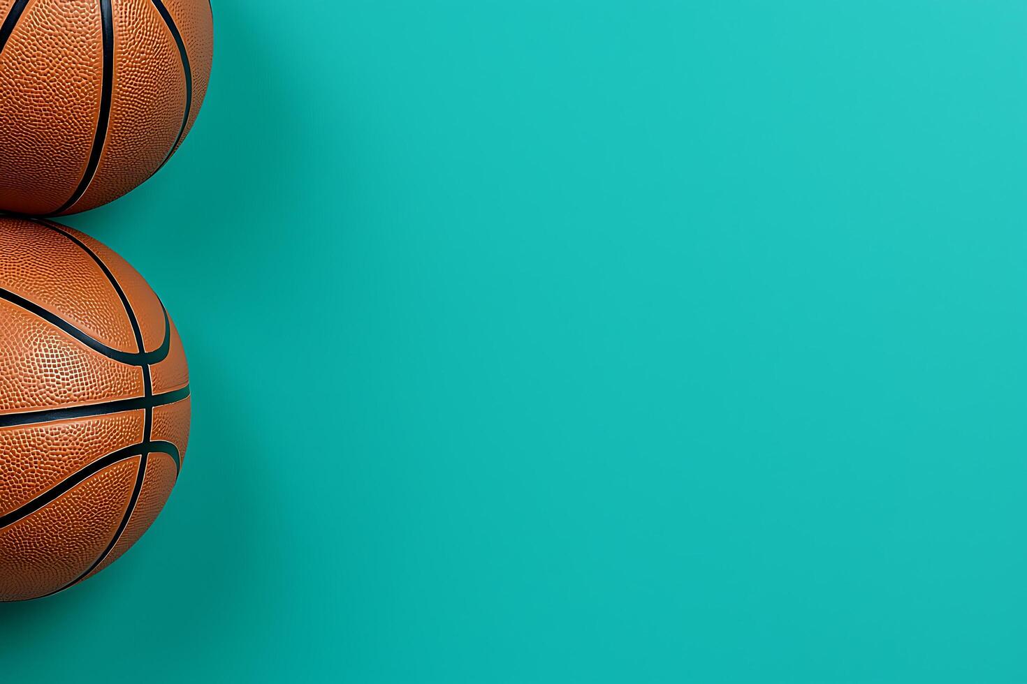Two Basketballs on a Teal Background Perfect for Sports-Themed Designs and Presentations. photo