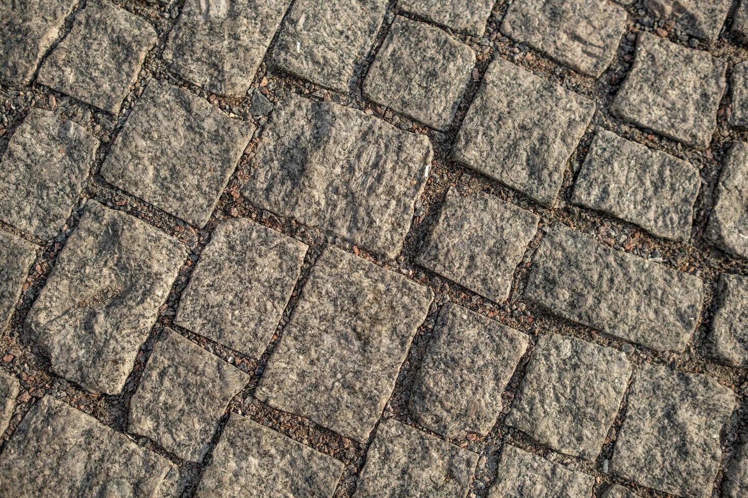 Cobblestone Pavement Design Showcasing Intricate Patterns in a Classic Urban Setting, Highlighting Craftsmanship and History in City Planning photo