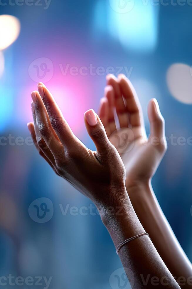 Hands expressing passion during a speech with vibrant lighting in the background and ample space for text photo