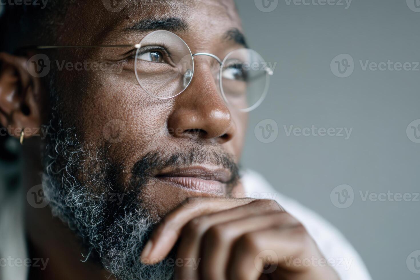 Black male copywriter creating innovative marketing slogans in a modern workspace photo