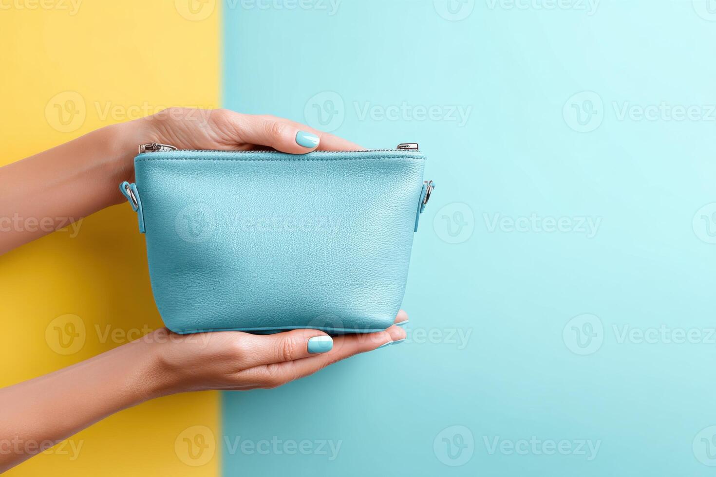 Bright cosmetic bag presented on a cheerful backdrop with clear space for text and emphasis on hands photo
