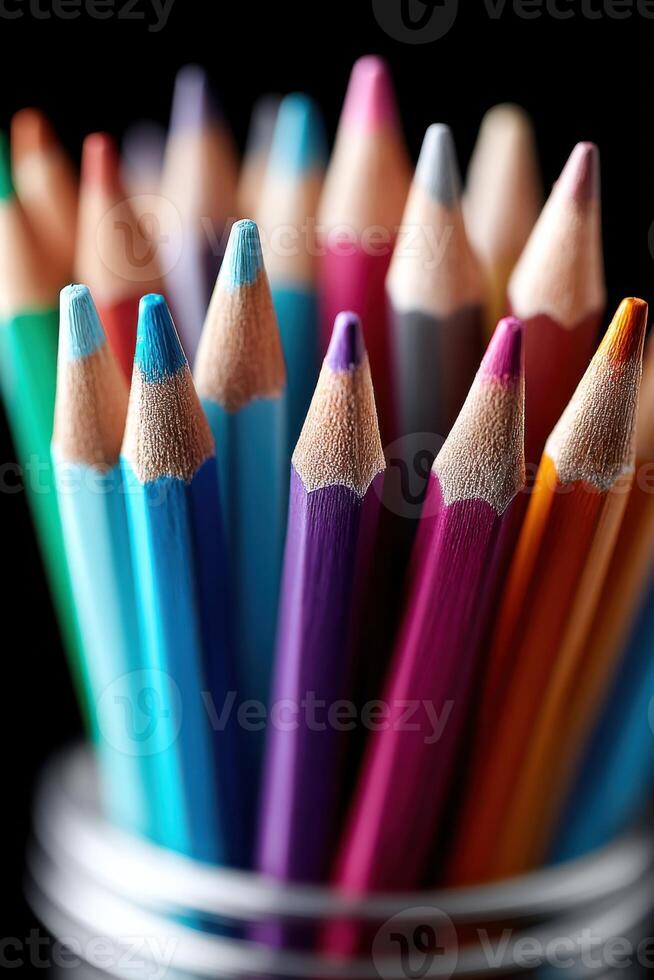 Unique arrangement of colorful pencils on a vibrant background for creative expression photo