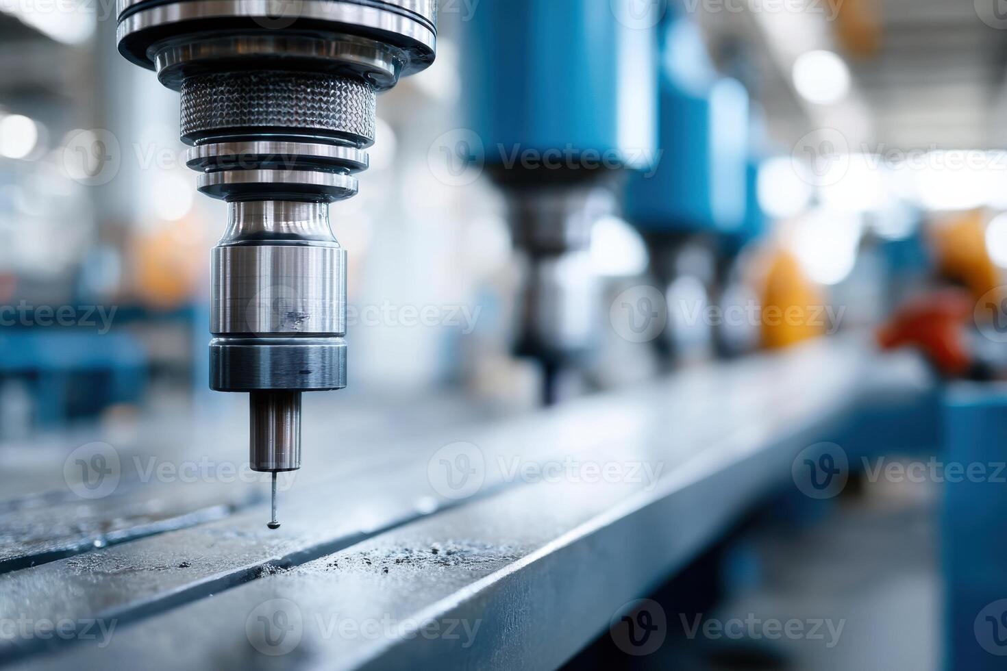 Close-up view of colorful drilling equipment on a production line in a manufacturing facility photo