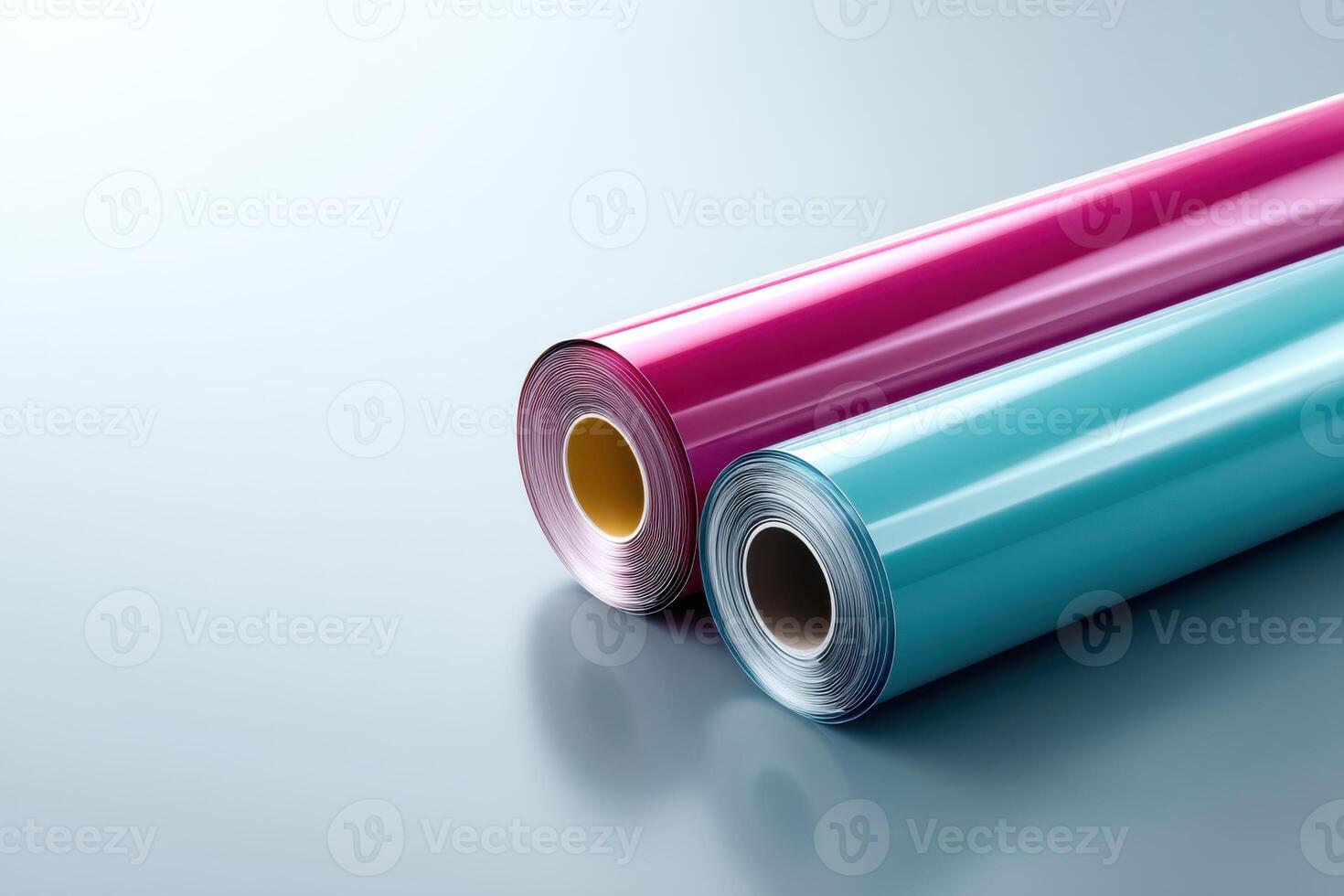 Colorful rolls of glossy vinyl film are ready for creative projects and designs in a stylish workspace photo