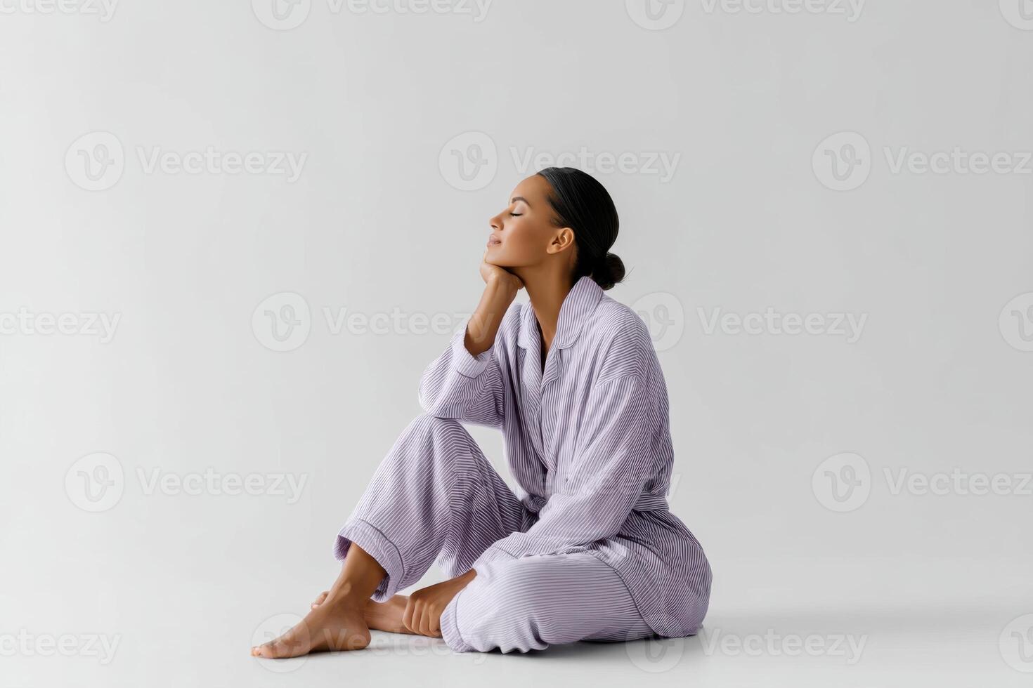 Relaxing in comfortable pajamas and robes for ultimate home pleasure on a white background photo