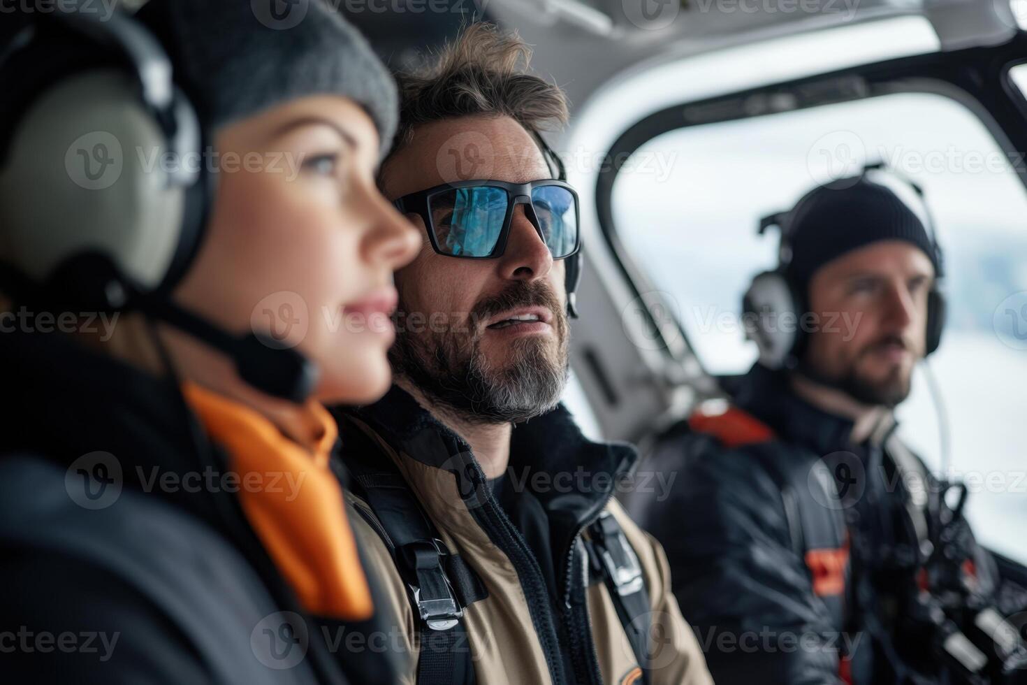 Diverse aerial navigators collaborate on route planning in a small aircraft photo
