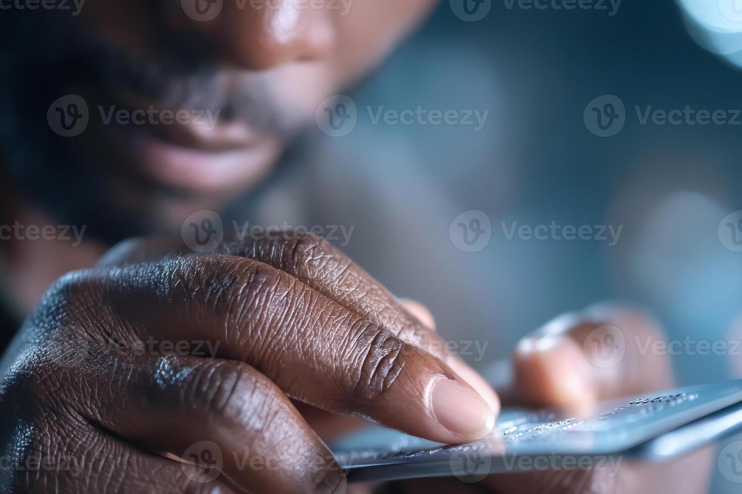 Close-up of hands checking IDs at a club entrance under soft lighting photo
