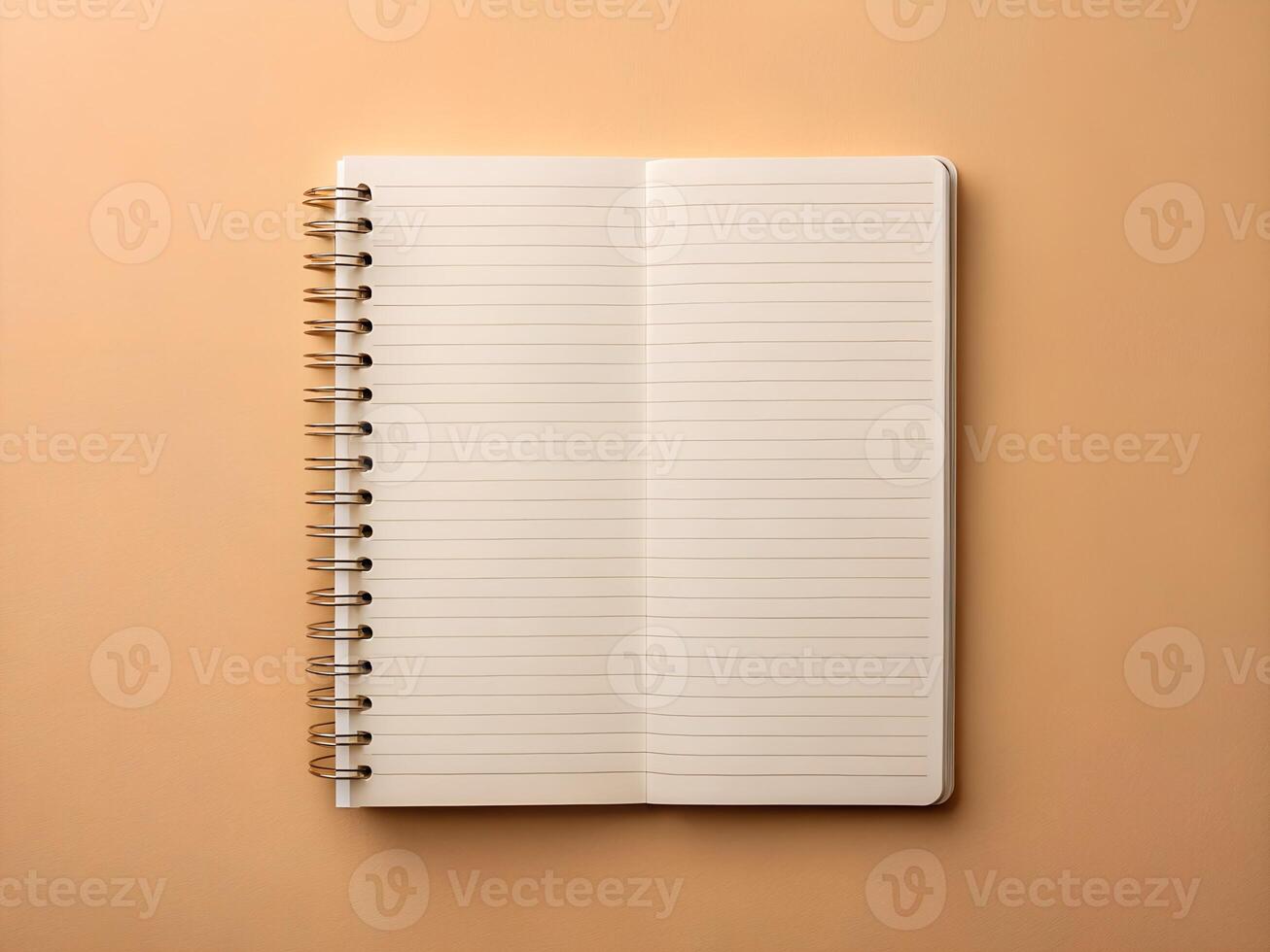 notebook on beige background photo