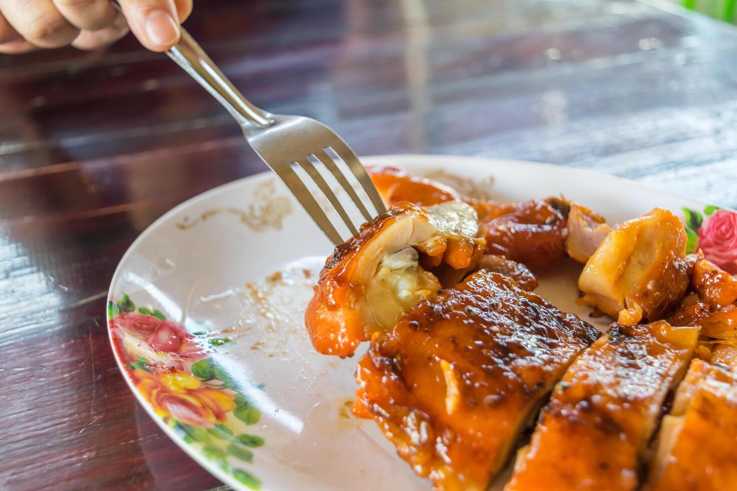 A plate of food with a fork and a knife photo