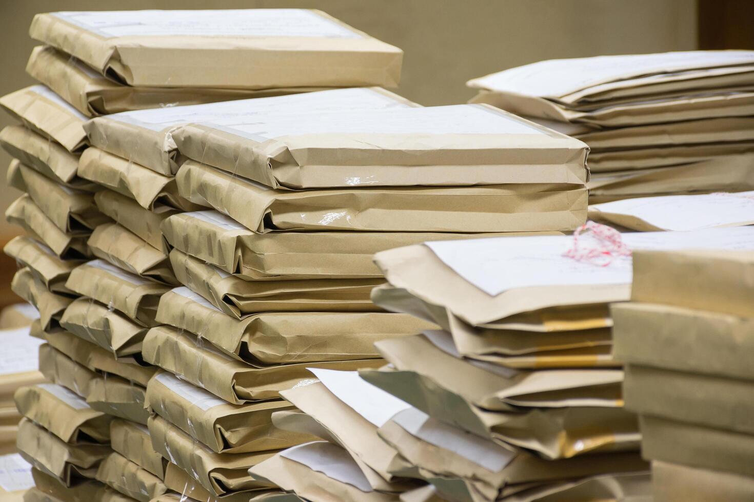 A pile of brown envelopes photo
