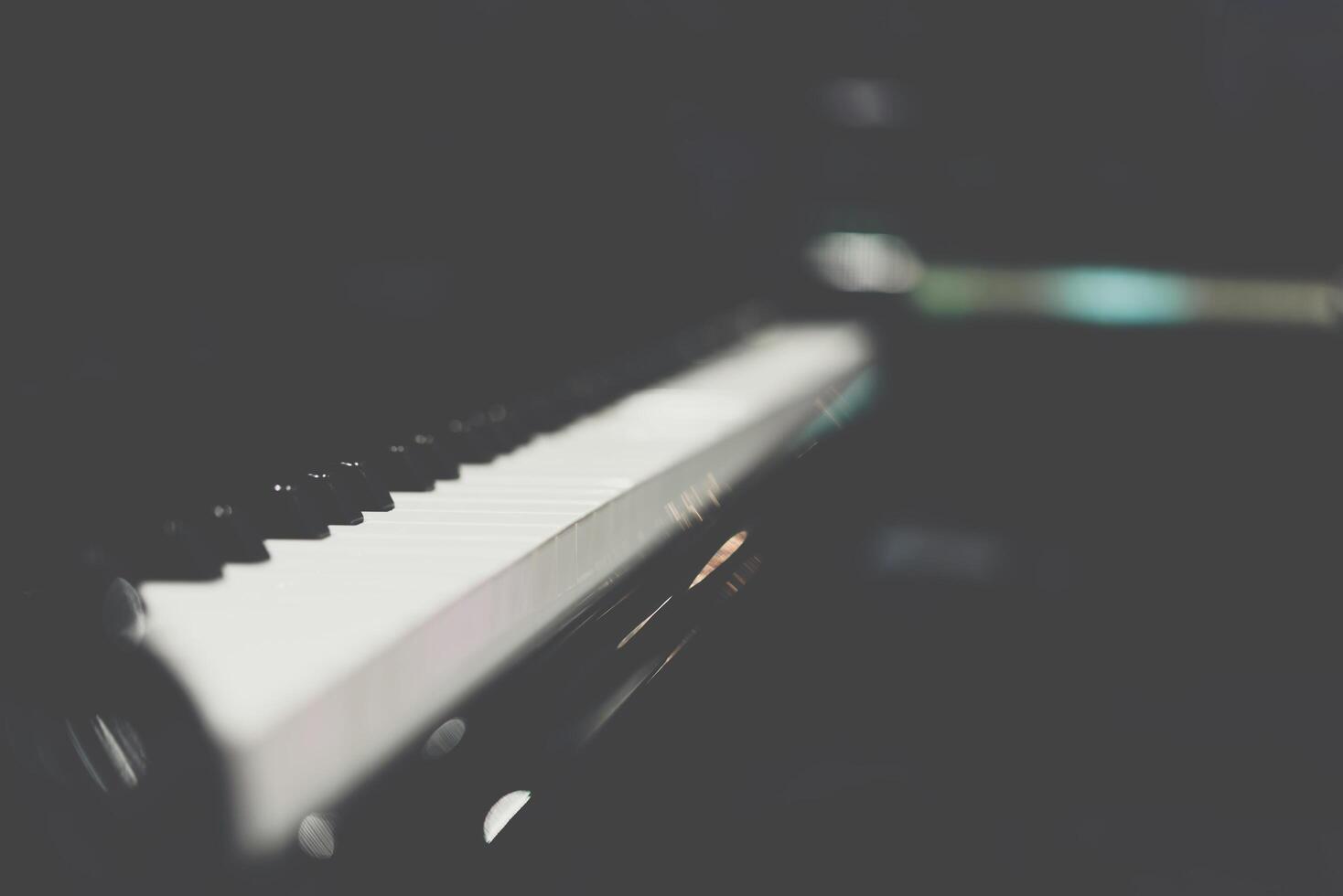 A close up of a piano keyboard photo