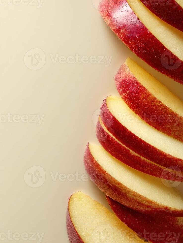 Sliced Apples Arranged Vertically With a Smooth Background Providing a Clean Aesthetic Suitable for Presentations or Culinary Displays photo
