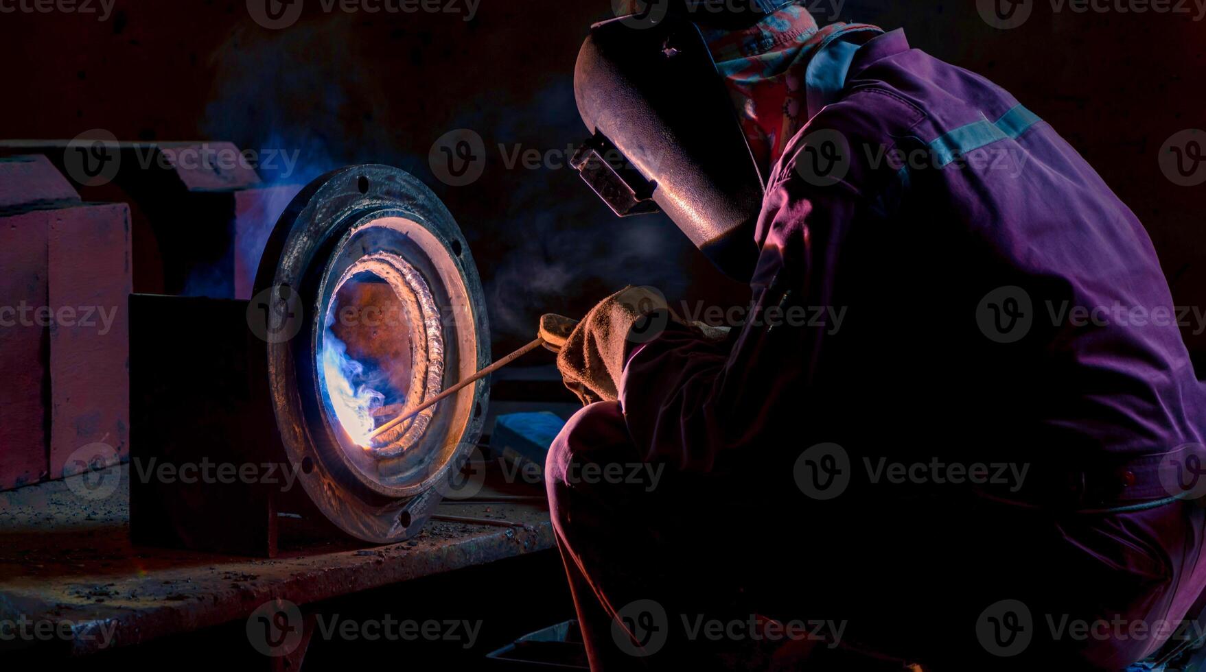 Welding steel structures and bright sparks photo