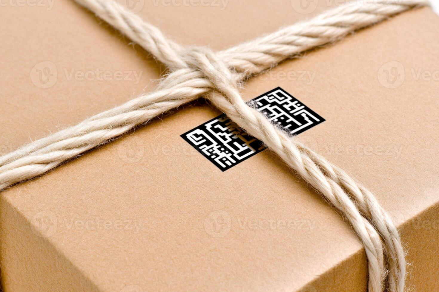 A brown box wrapped in rope with a qr code photo