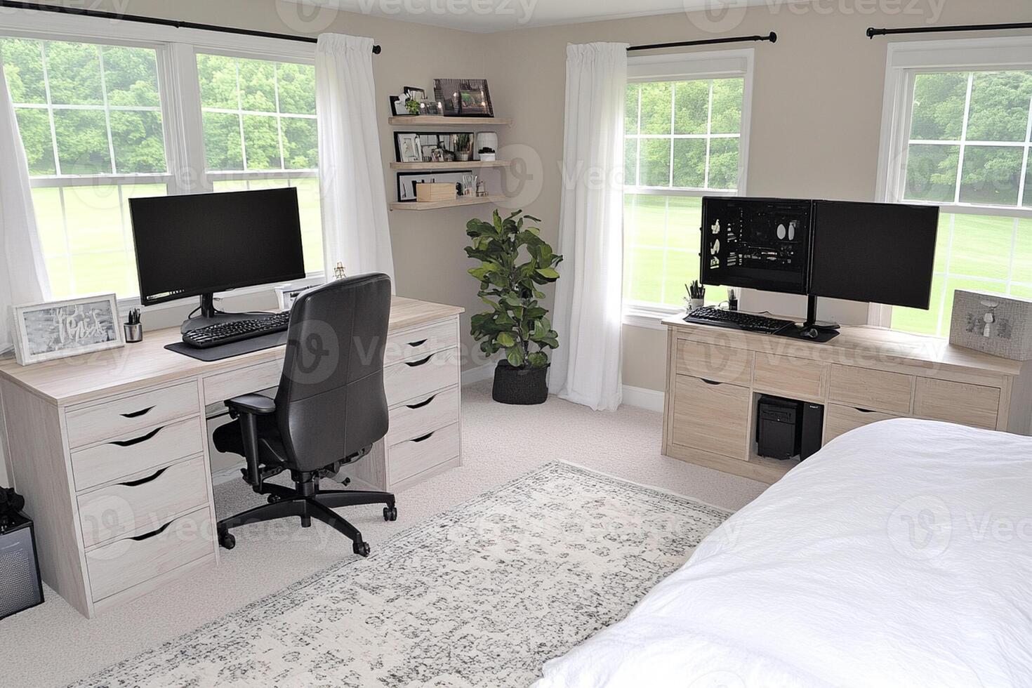 A bedroom with a desk and a computer on it photo