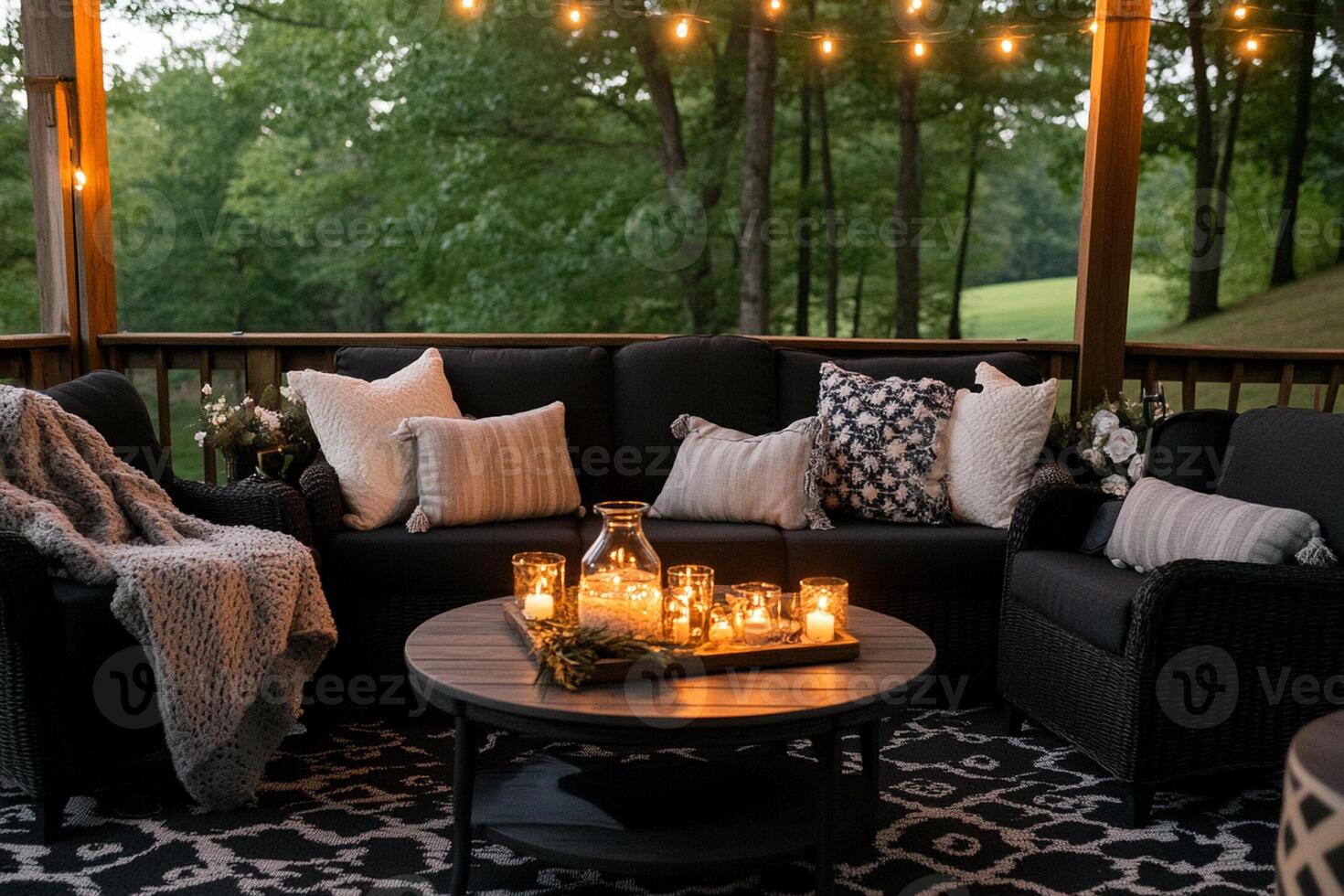 Outdoor patio with string lights and candles photo