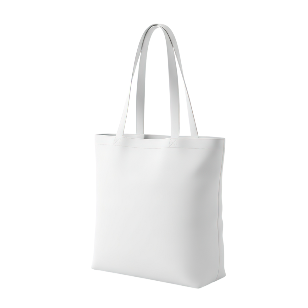 A plain white canvas tote bag with two handles stands upright on a clean white surface isolated on transparent background png