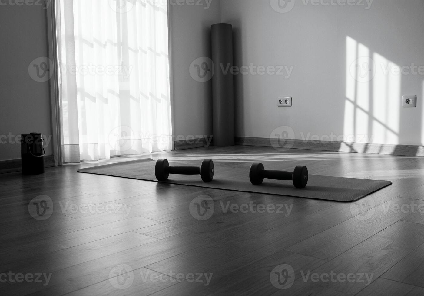 A black and white photo of a gym room