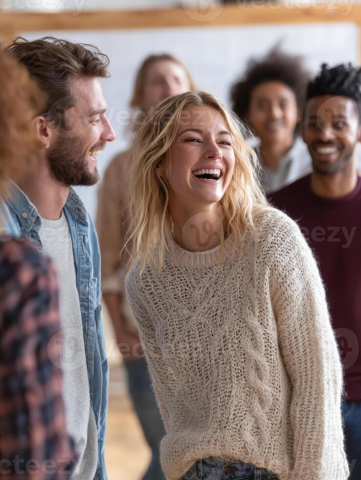 Group of Colleagues Enjoying Laughter and Connection During a Team-Building Exercise in a Warm and Inviting Indoor Space photo