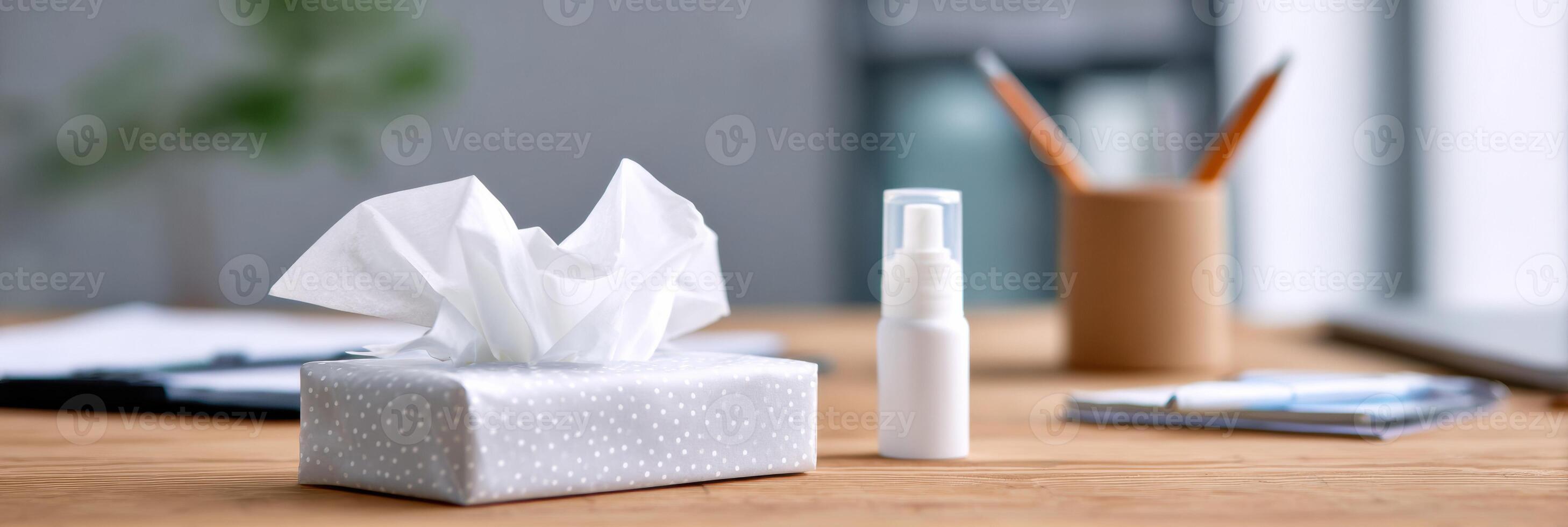 Tissue Packet and Nasal Spray on an Office Desk During Remote Work Hours With Minimalist Background photo