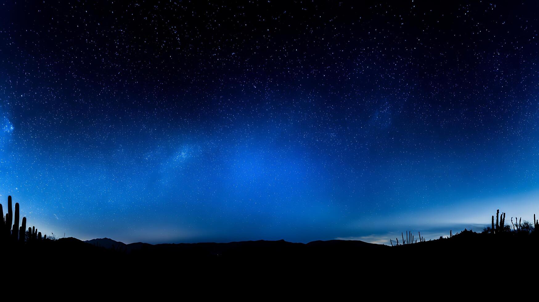 Vast Desert Night Sky Filled with Stars Over Silhouetted Cacti. photo