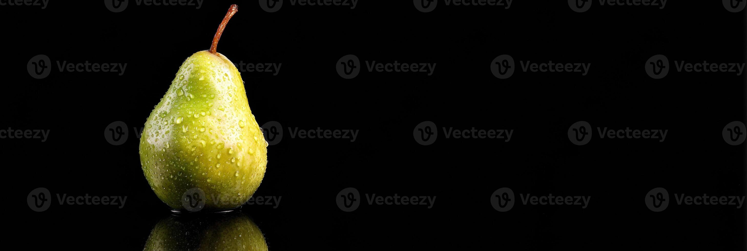 Single Pear on Reflective Black Glass Surface With Dramatic Lighting Showcasing Its Freshness and Texture, Highlighting a Minimalist Aesthetic photo